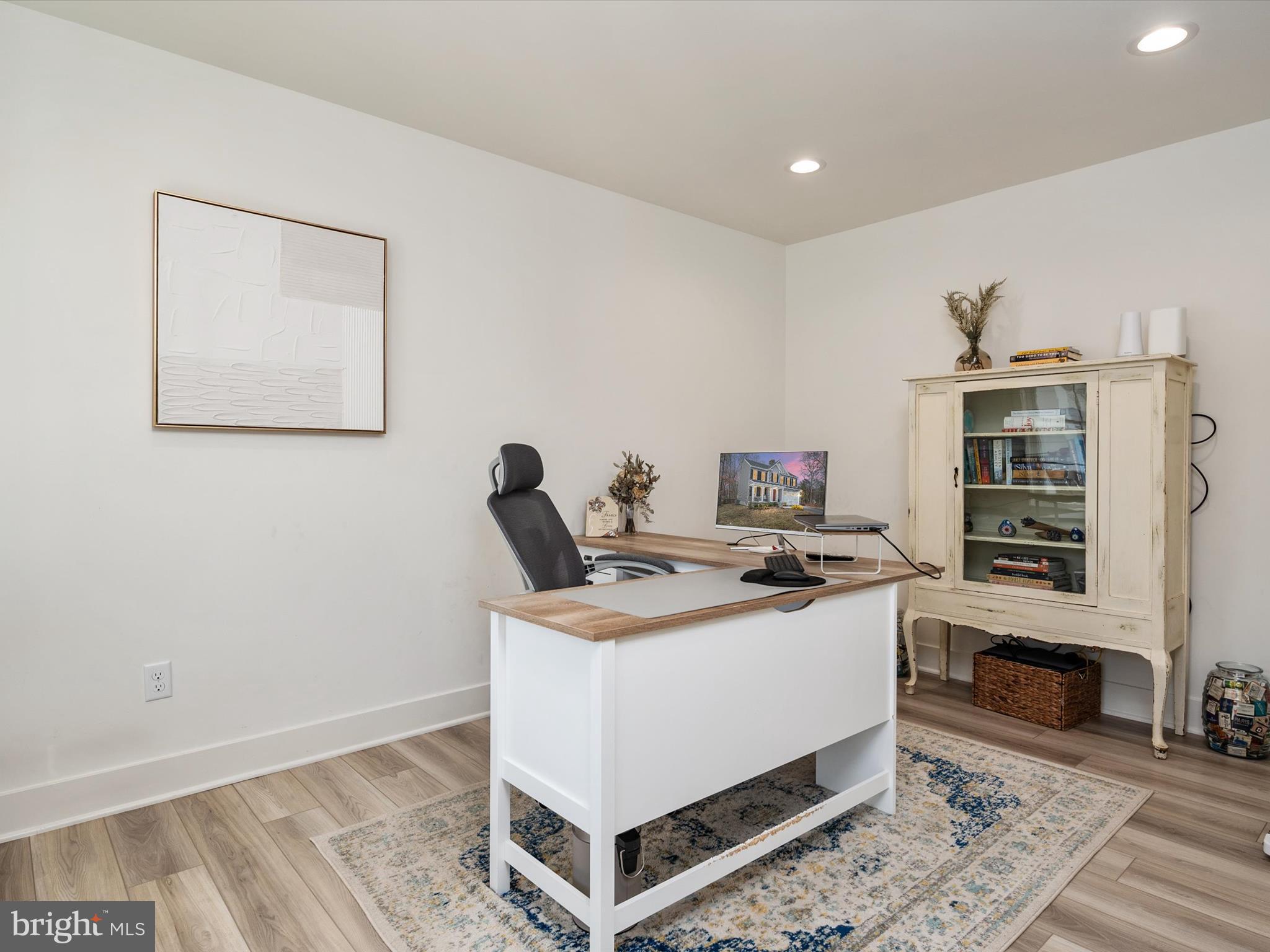 8412 Maryland Road Pasadena, MD 21122 - Photo 14 of 61 a workspace with furniture and window