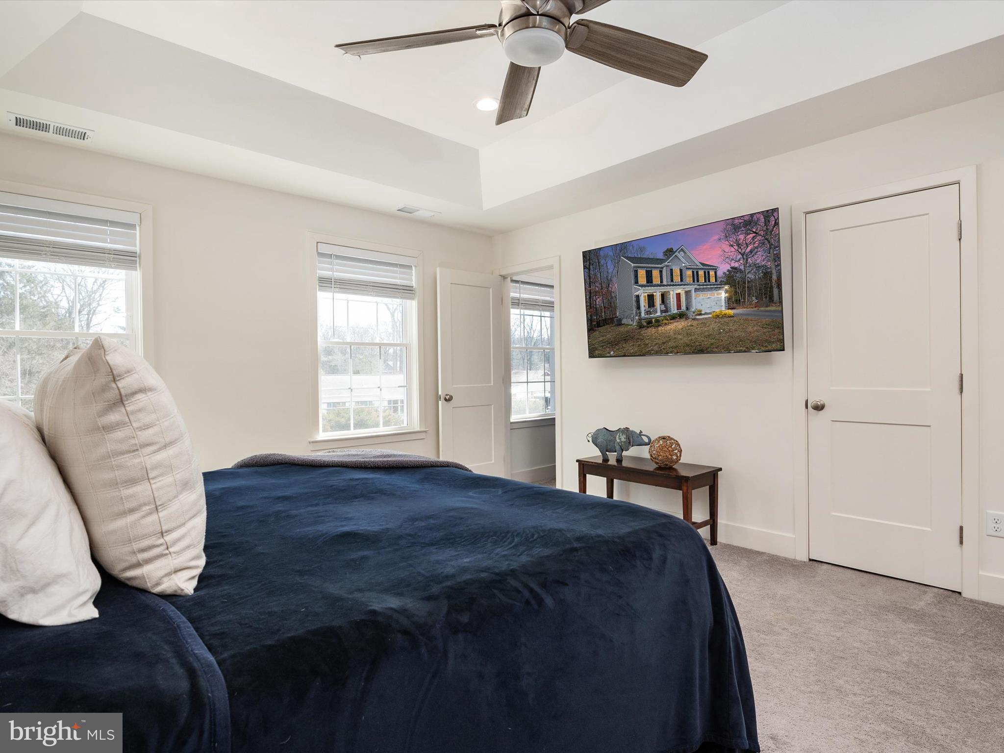 8412 Maryland Road Pasadena, MD 21122 - Photo 29 of 61 a bedroom with a bed and furniture