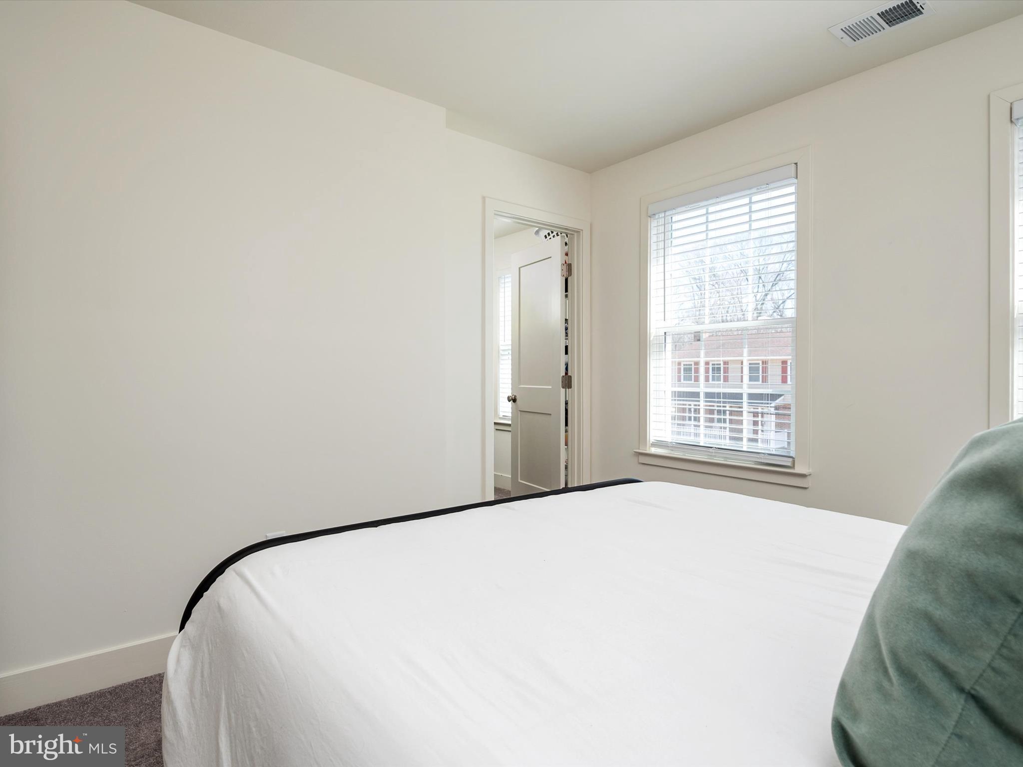 8412 Maryland Road Pasadena, MD 21122 - Photo 39 of 61 a view of a big room with windows and closet