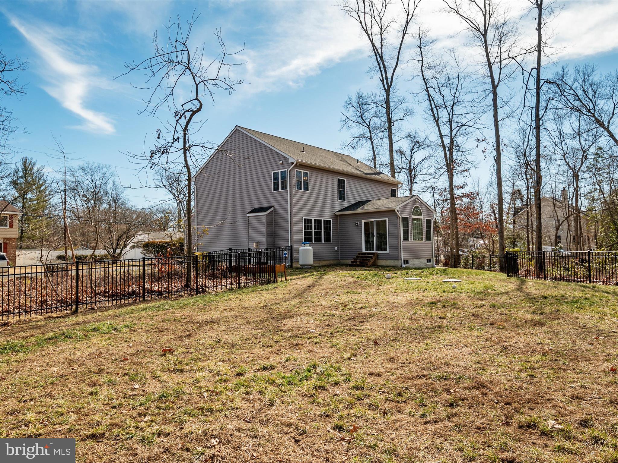 8412 Maryland Road Pasadena, MD 21122 - Photo 47 of 61 a front view of a house with a yard