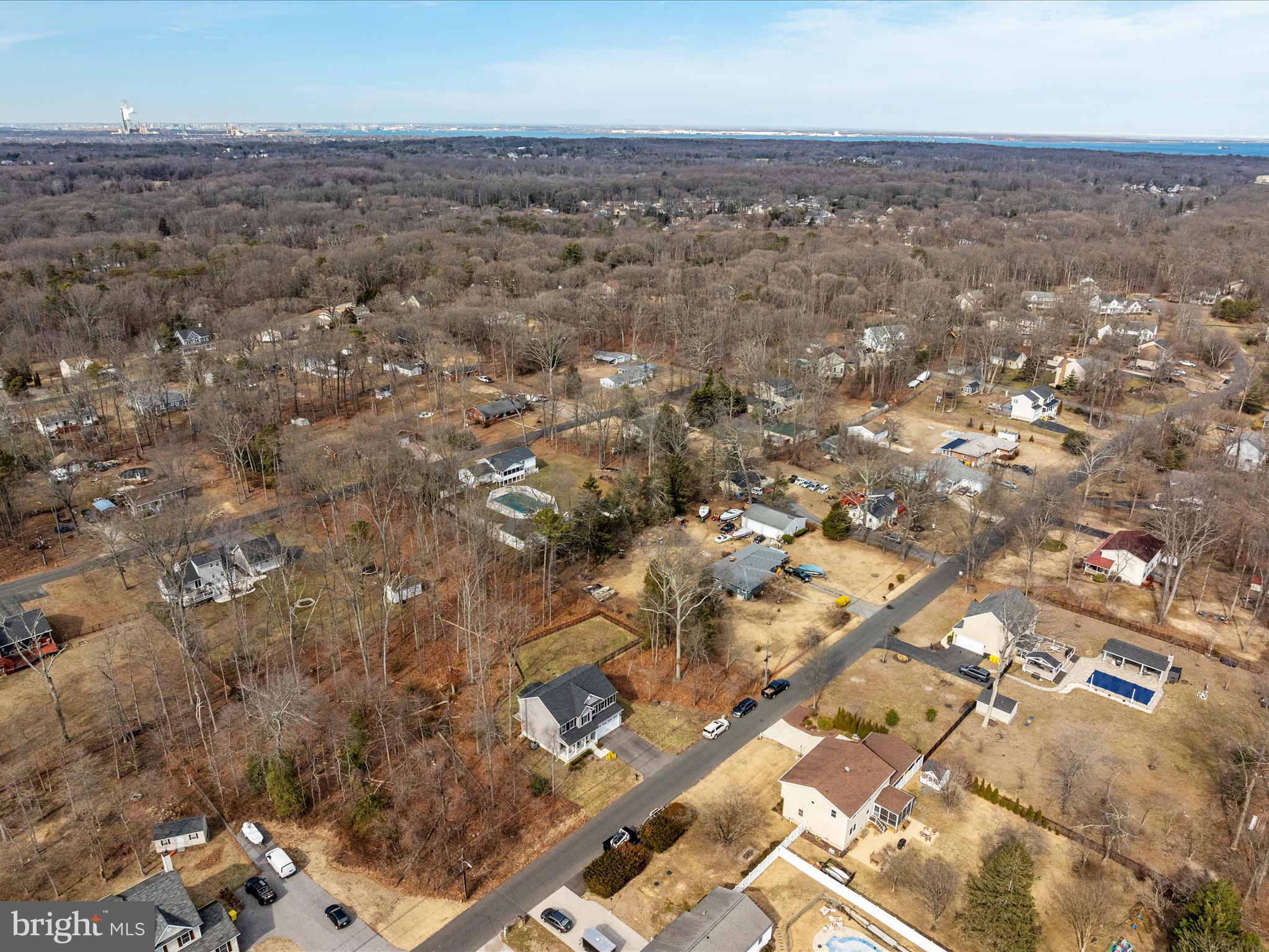 8412 Maryland Road Pasadena, MD 21122 - Photo 49 of 61 an aerial view of house with yard and mountain view in back