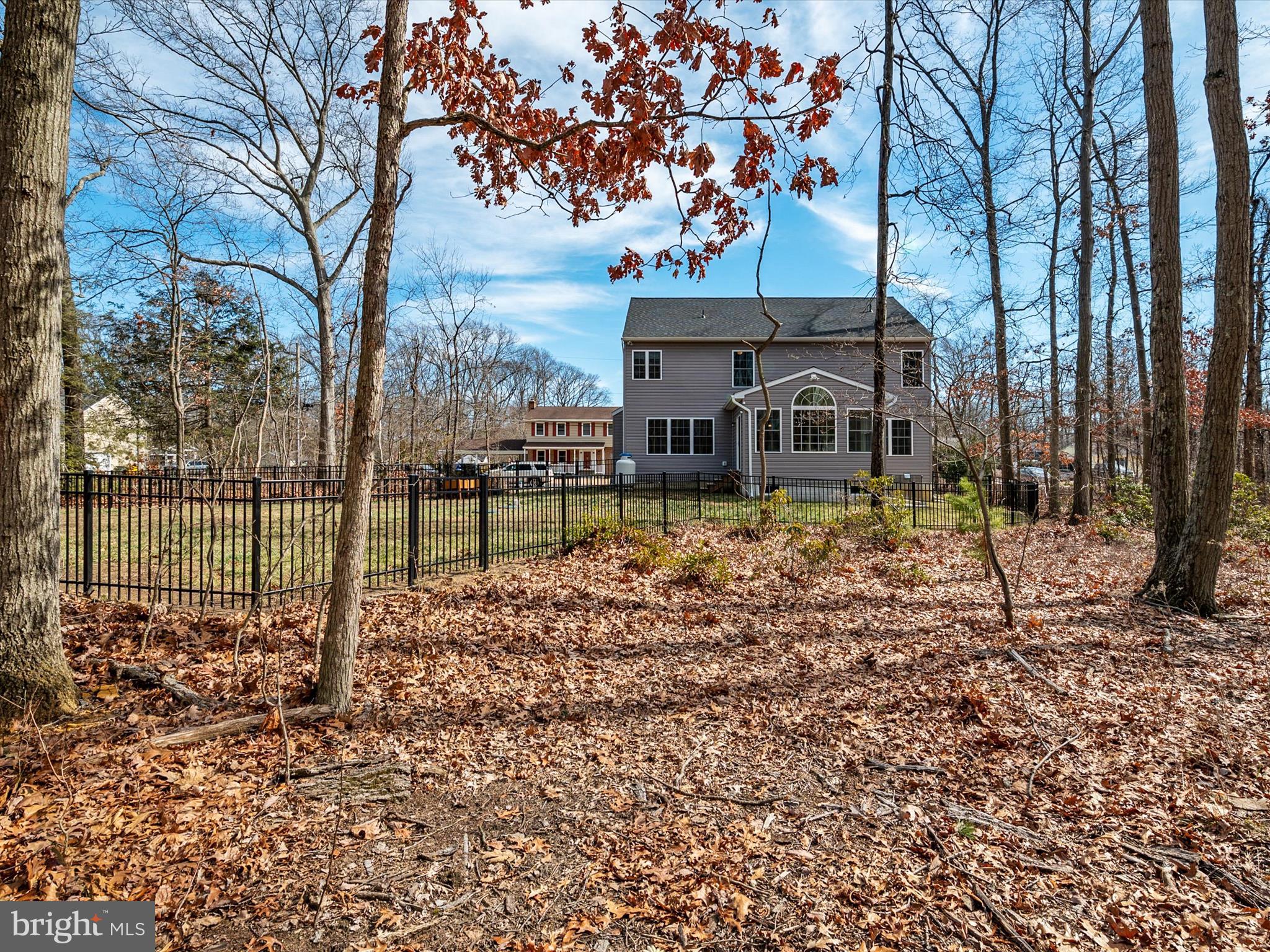 8412 Maryland Road Pasadena, MD 21122 - Photo 56 of 61 a view of a house with a yard