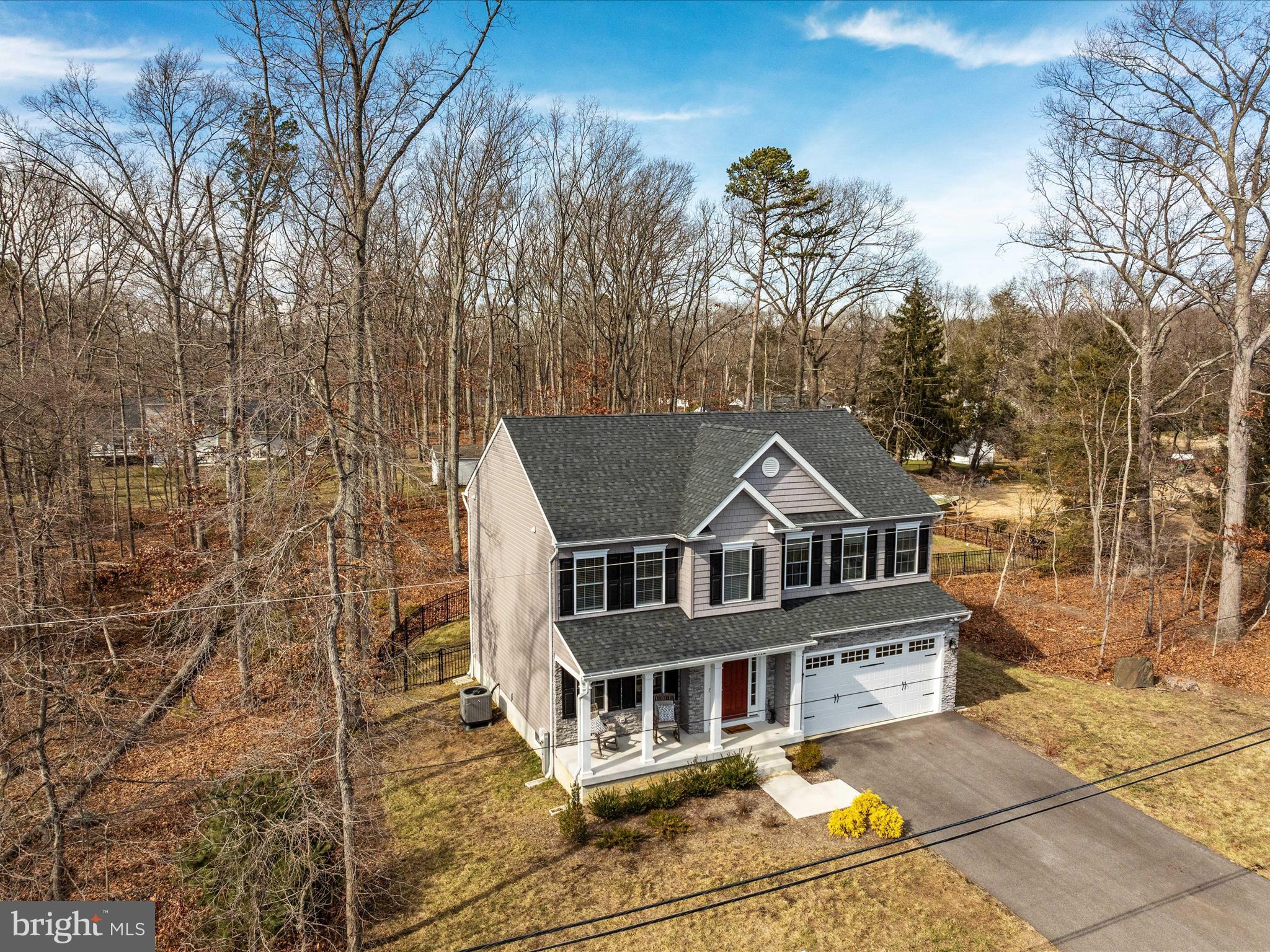 8412 Maryland Road Pasadena, MD 21122 - Photo 10 of 61 a aerial view of a house with a yard and potted plants