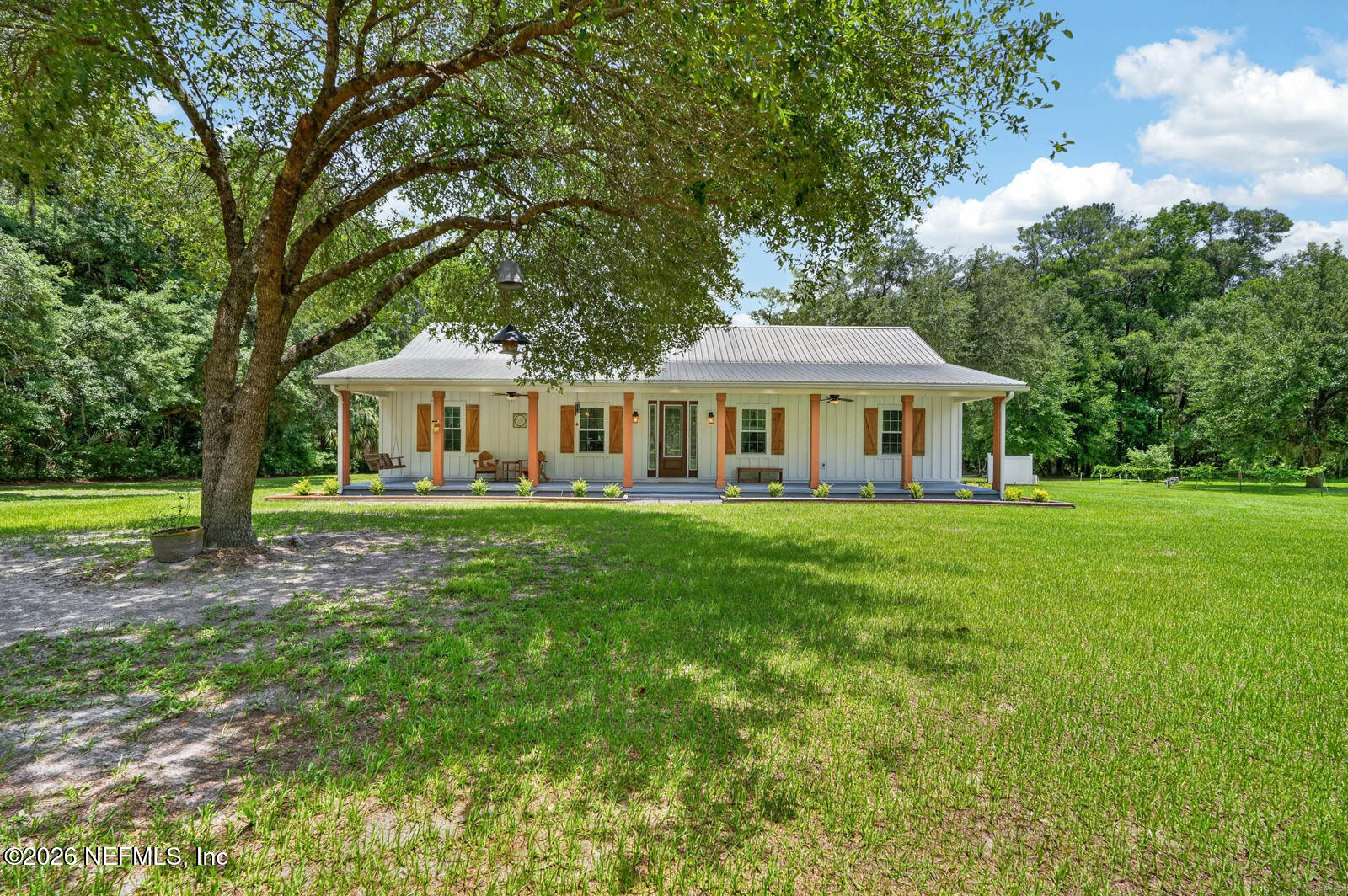 264 Peniel Church Road Palatka, FL 32177 - Photo 3 of 48 a front view of a house with a yard