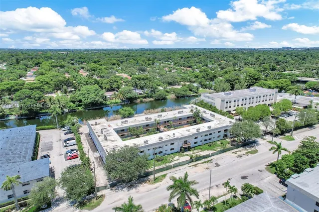 a view of a garden with lawn chairs