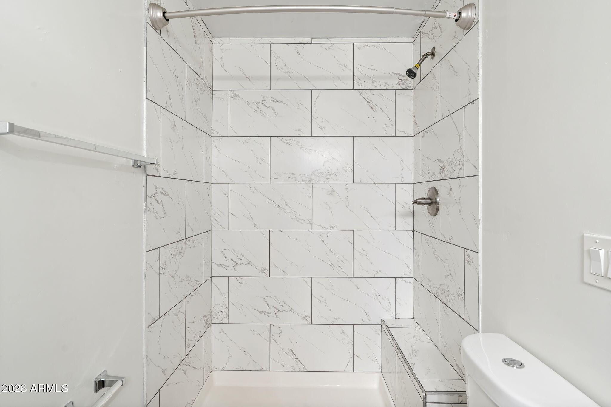 1707 North 18th Street, Unit B7 Phoenix, AZ 85006 - Photo 11 of 14 a bathroom with a shower