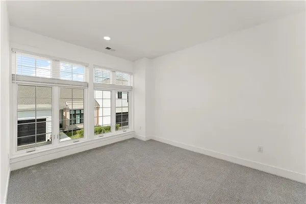 en empty room with windows