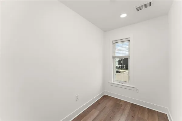 a view of a room that has a window in it
