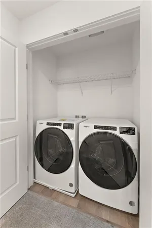 a utility room with dryer and washer