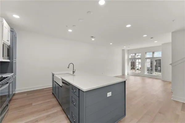 a bathroom with a sink a vanity and a mirror