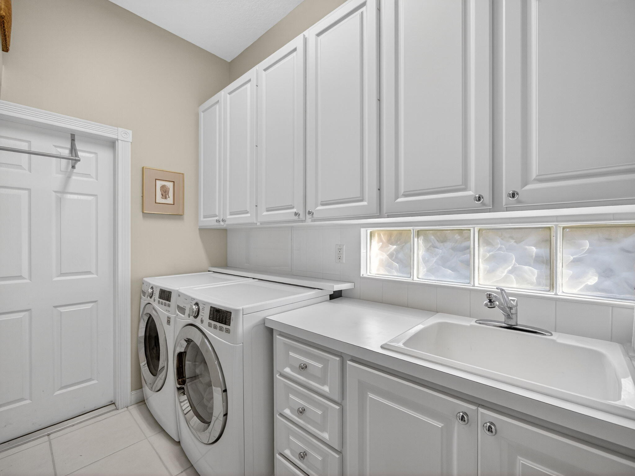 1590 Southwest Balmoral Trace Stuart, FL 34997 - Photo 28 of 38 Laundry Room