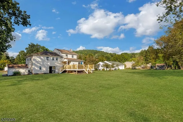 a view of a house with a big yard