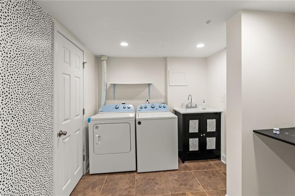 1430 Eldorada Road Winston-Salem, NC 27103 - Photo 35 of 45 Laundry Room with sink and storage.