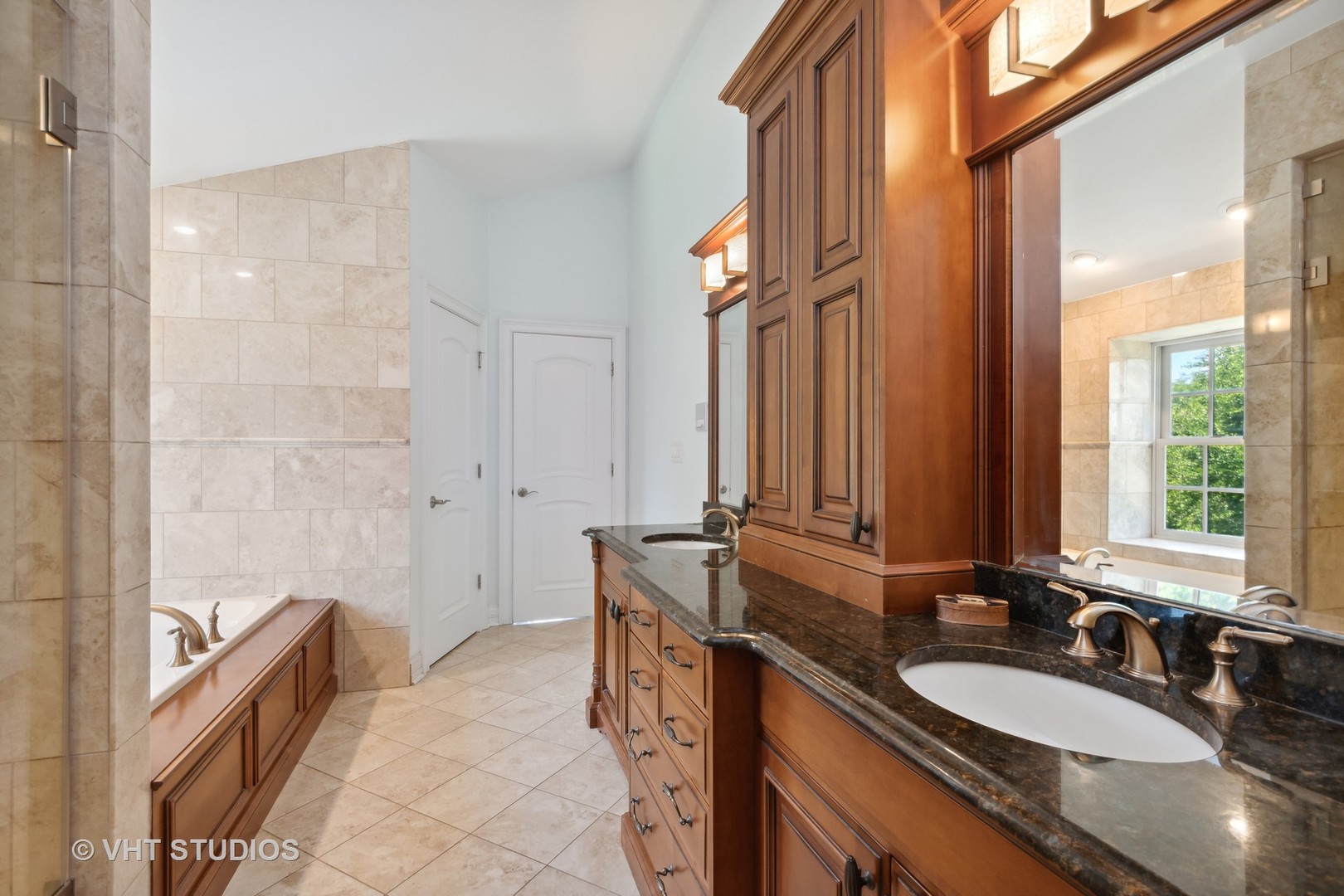 562 A Aberdeen Road Frankfort, IL 60423 - Photo 18 of 47 a bathroom with a granite countertop double vanity sink a mirror and a bathtub