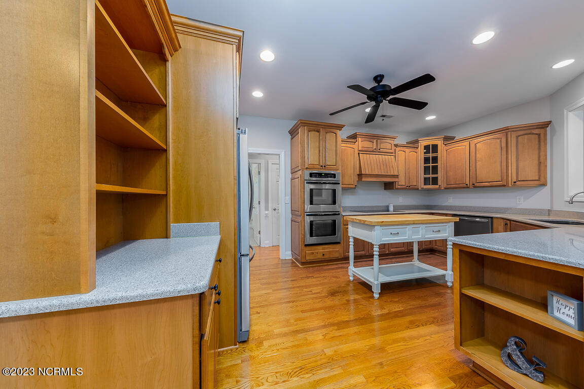 915 Fields Road New Bern, NC 28560 - Photo 2 of 36 Kitchen with custom cabinetry and dual wall ovens