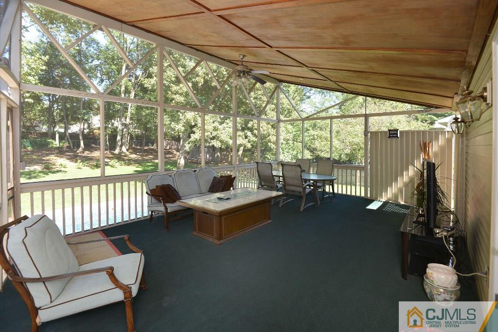 27 Thomas Road East Brunswick, NJ 08816 - Photo 20 of 24 a outdoor living space with furniture and garden view