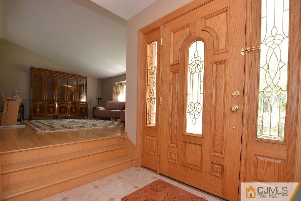 27 Thomas Road East Brunswick, NJ 08816 - Photo 3 of 24 a view of a entryway door
