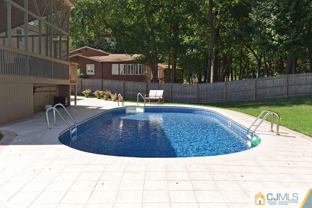 27 Thomas Road East Brunswick, NJ 08816 - Photo 23 of 24 a view of a backyard