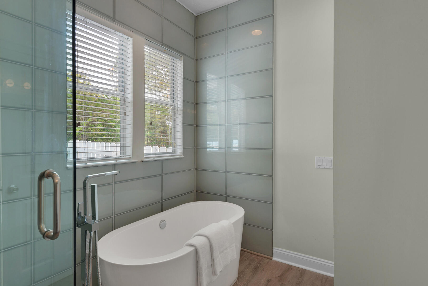 108 Pelican Circle Inlet Beach, FL 32461 - Photo 15 of 75 a bathroom with a white bath tub and a window