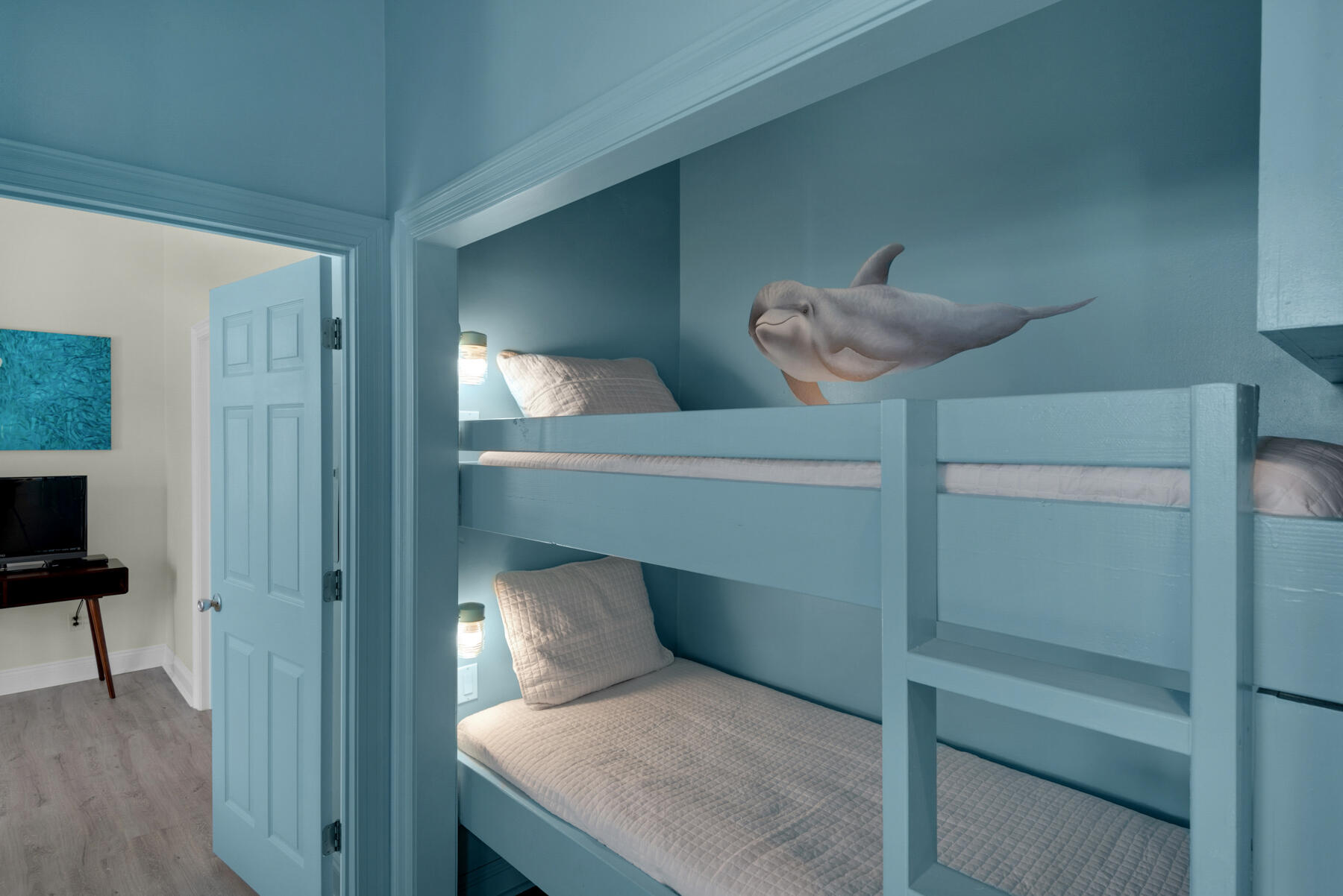 108 Pelican Circle Inlet Beach, FL 32461 - Photo 19 of 75 a bedroom with a bed and a chandelier