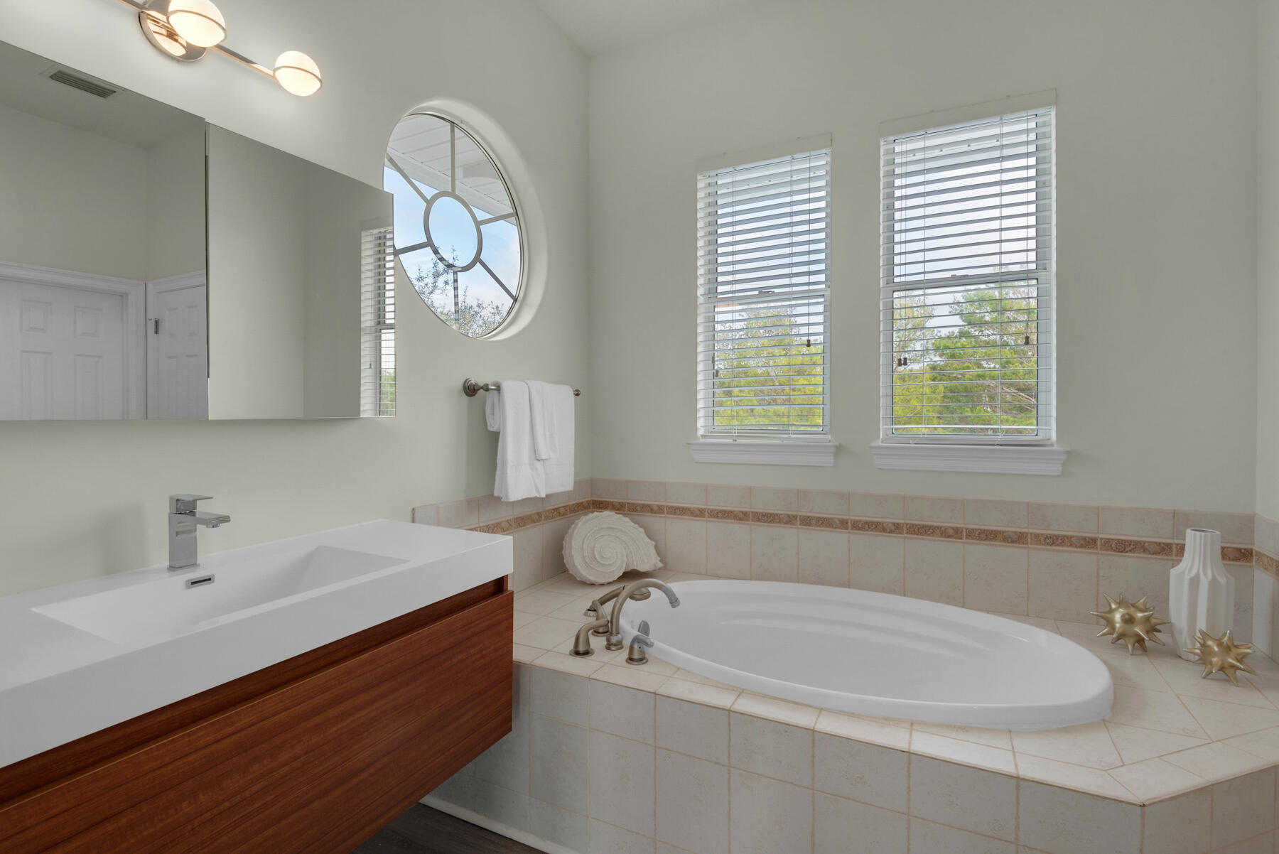 108 Pelican Circle Inlet Beach, FL 32461 - Photo 21 of 75 a white bath tub sitting next to a white sink