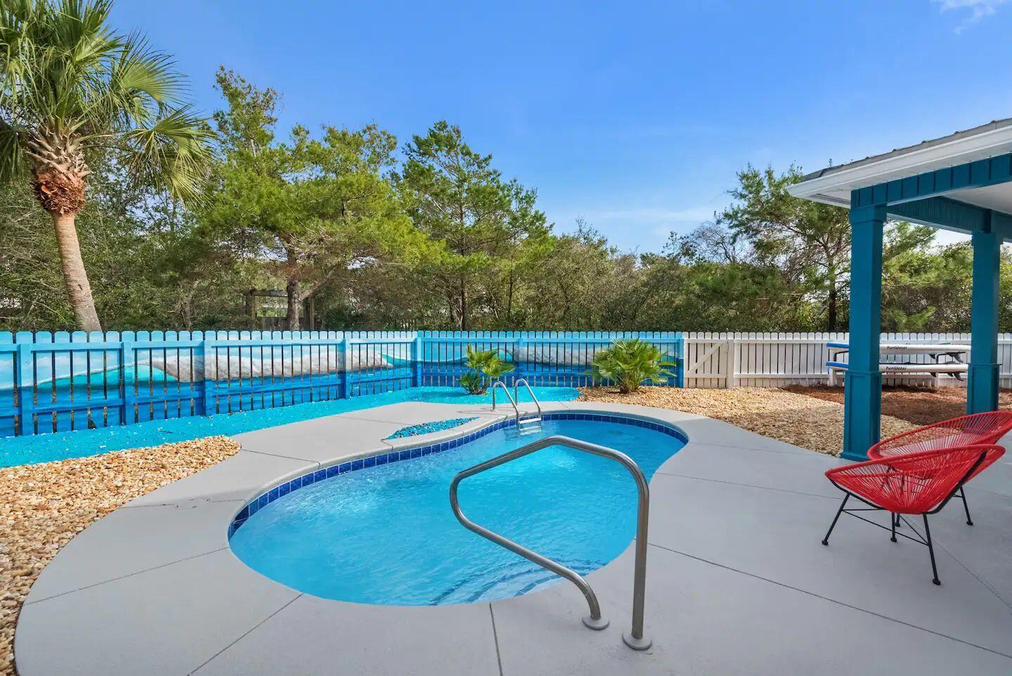 108 Pelican Circle Inlet Beach, FL 32461 - Photo 32 of 75 a view of a swimming pool with a lounge chair