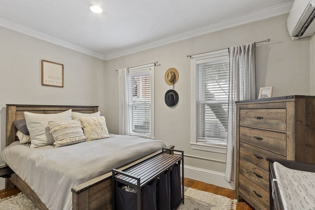 192 West Fifth Street, Unit 1 Boston, MA 02127 - Photo 15 of 24 a bedroom with a bed and a window