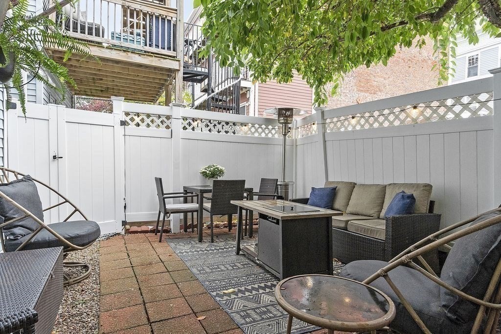 192 West Fifth Street, Unit 1 Boston, MA 02127 - Photo 19 of 24 a patio with table and chairs