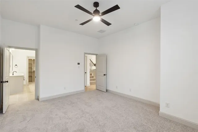 a bathroom with a double vanity sink and mirror