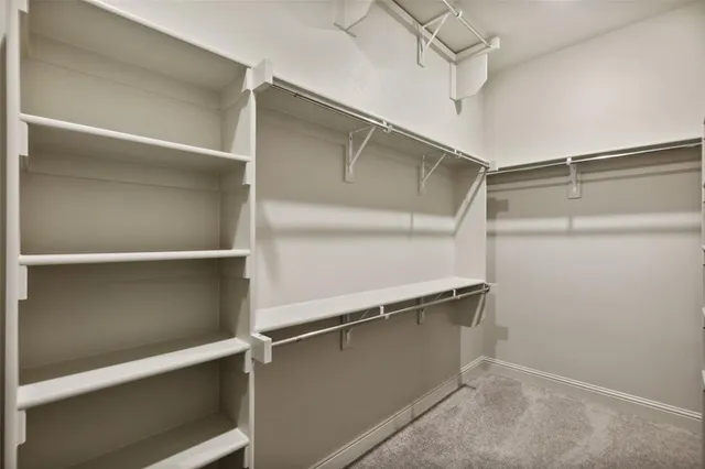 a view of gallery with wooden floor