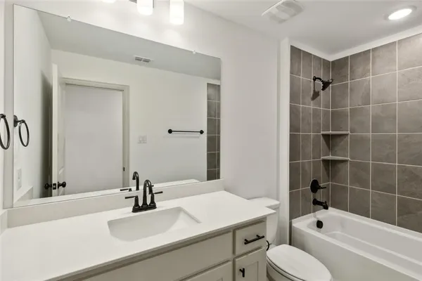 a view of house with yard