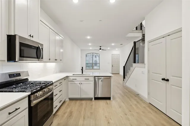 a view of cabinets and window