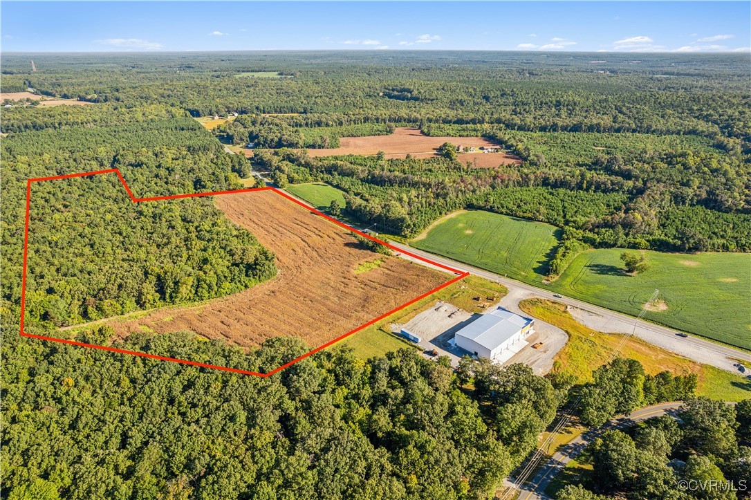 0 King William Road Aylett, VA 23009 - Photo 3 of 16 an aerial view of a house with a yard and lake view