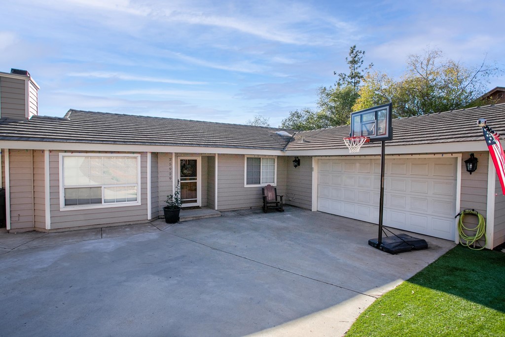 25929 Matlin Road Ramona, CA 92065 - Photo 18 of 19 a view of a house with backyard