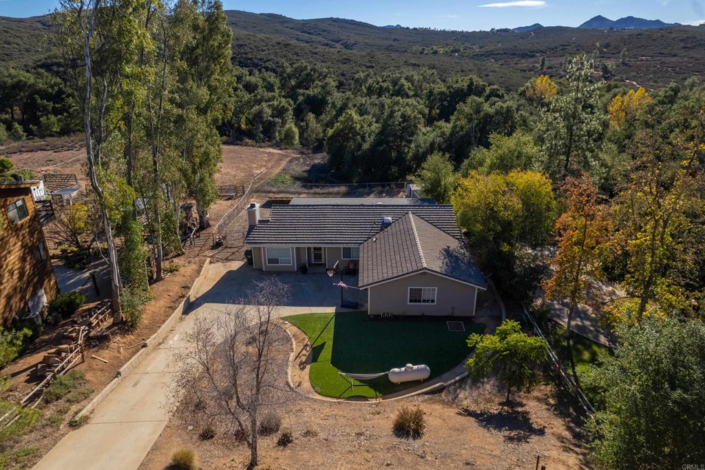 25929 Matlin Road Ramona, CA 92065 - Photo 19 of 19 an aerial view of a house with a yard