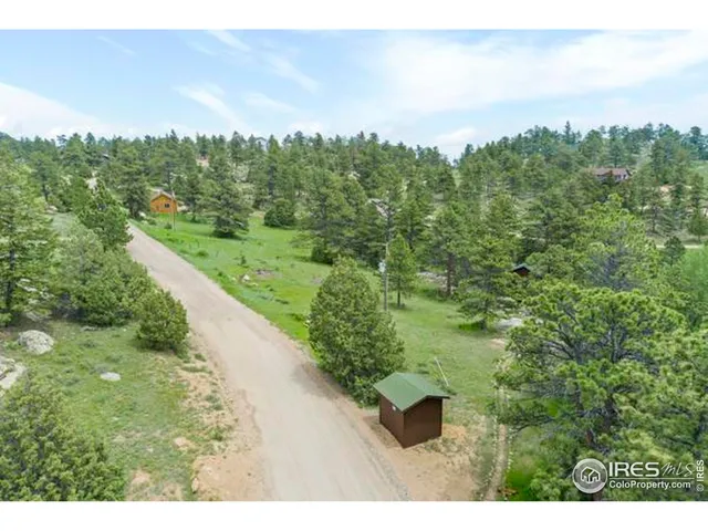 a view of a garden with a lake