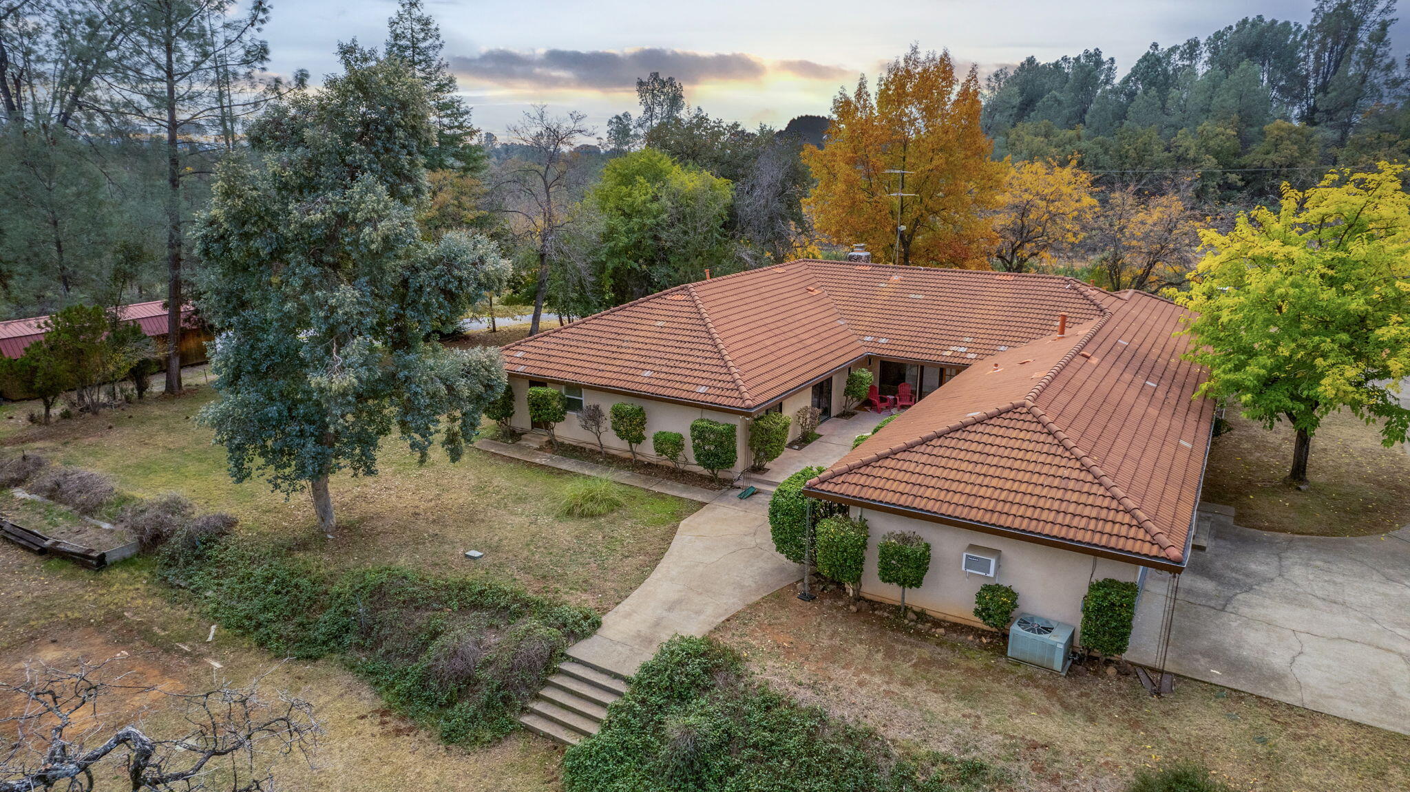 13144 Bear Mountain Road Redding, CA 96003 - Photo 15 of 69 an aerial view of a house with a yard table and chairs