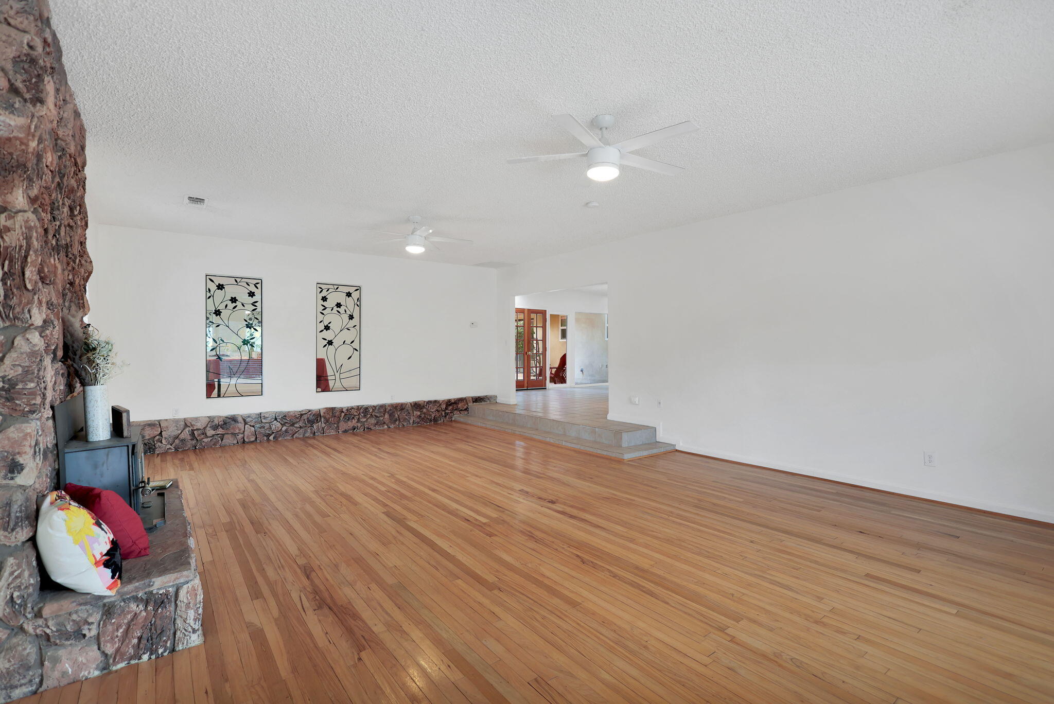 13144 Bear Mountain Road Redding, CA 96003 - Photo 18 of 69 a view of empty room with wooden floor