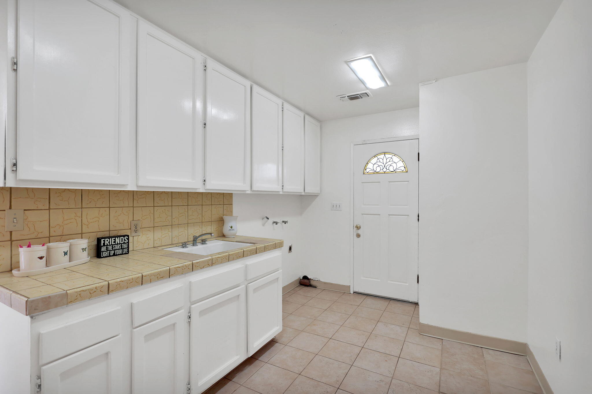 13144 Bear Mountain Road Redding, CA 96003 - Photo 29 of 69 a kitchen with a sink and cabinets