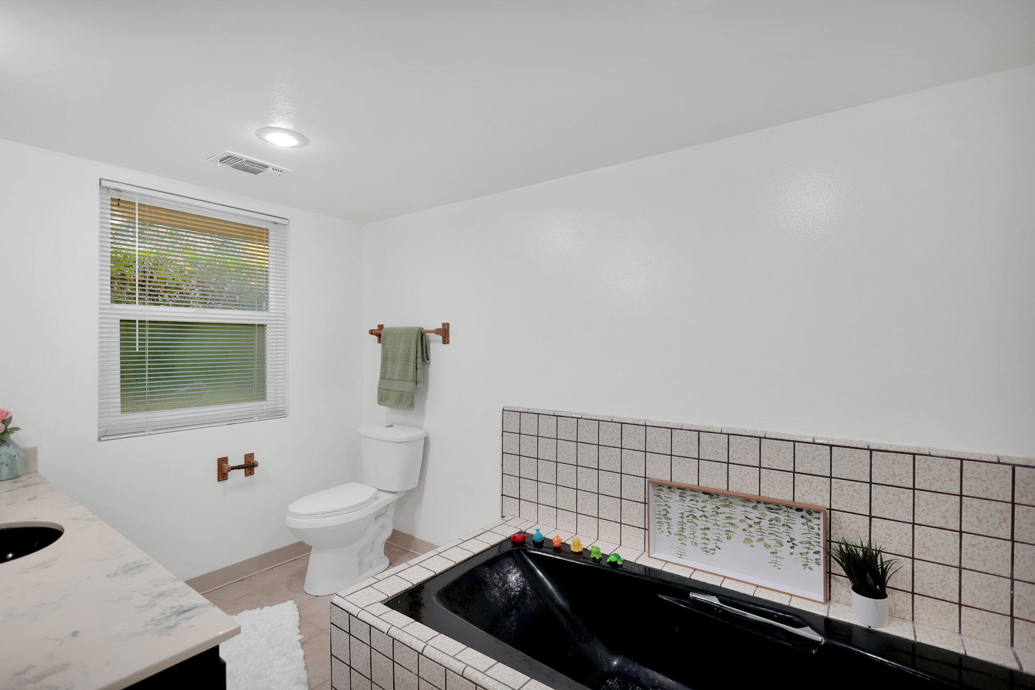 13144 Bear Mountain Road Redding, CA 96003 - Photo 46 of 69 a bathroom with a sink and a toilet