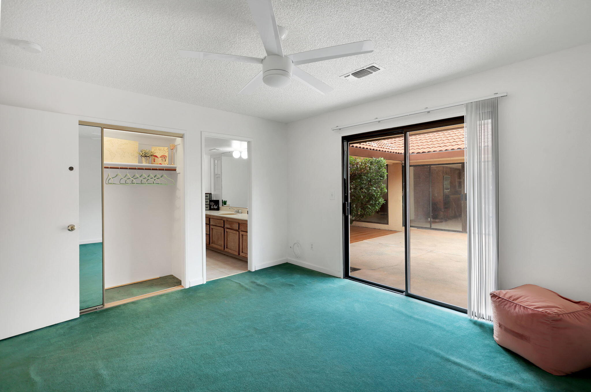 13144 Bear Mountain Road Redding, CA 96003 - Photo 50 of 69 a view of an empty room with closet and a window