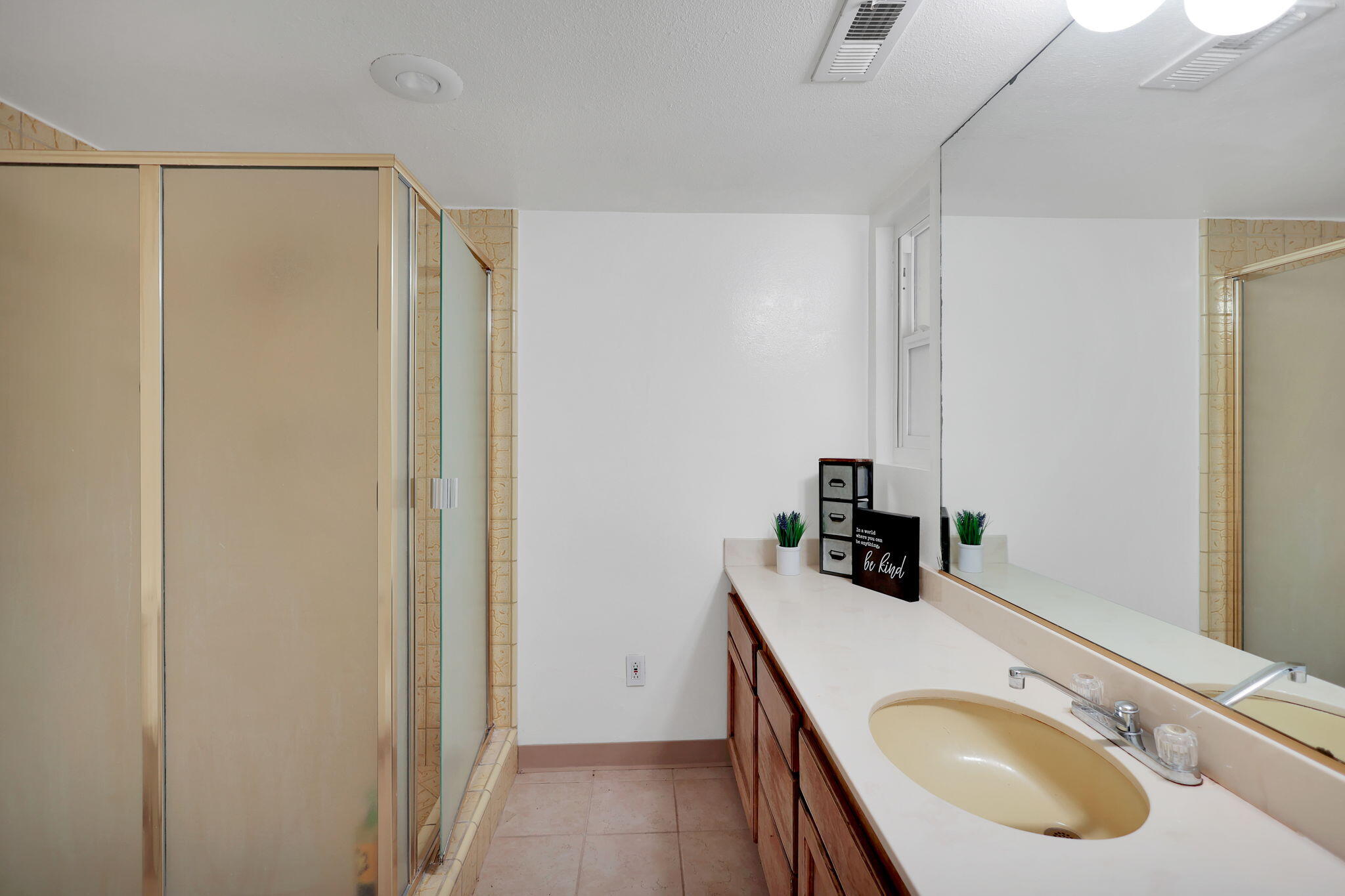 13144 Bear Mountain Road Redding, CA 96003 - Photo 51 of 69 a bathroom with a sink and a mirror
