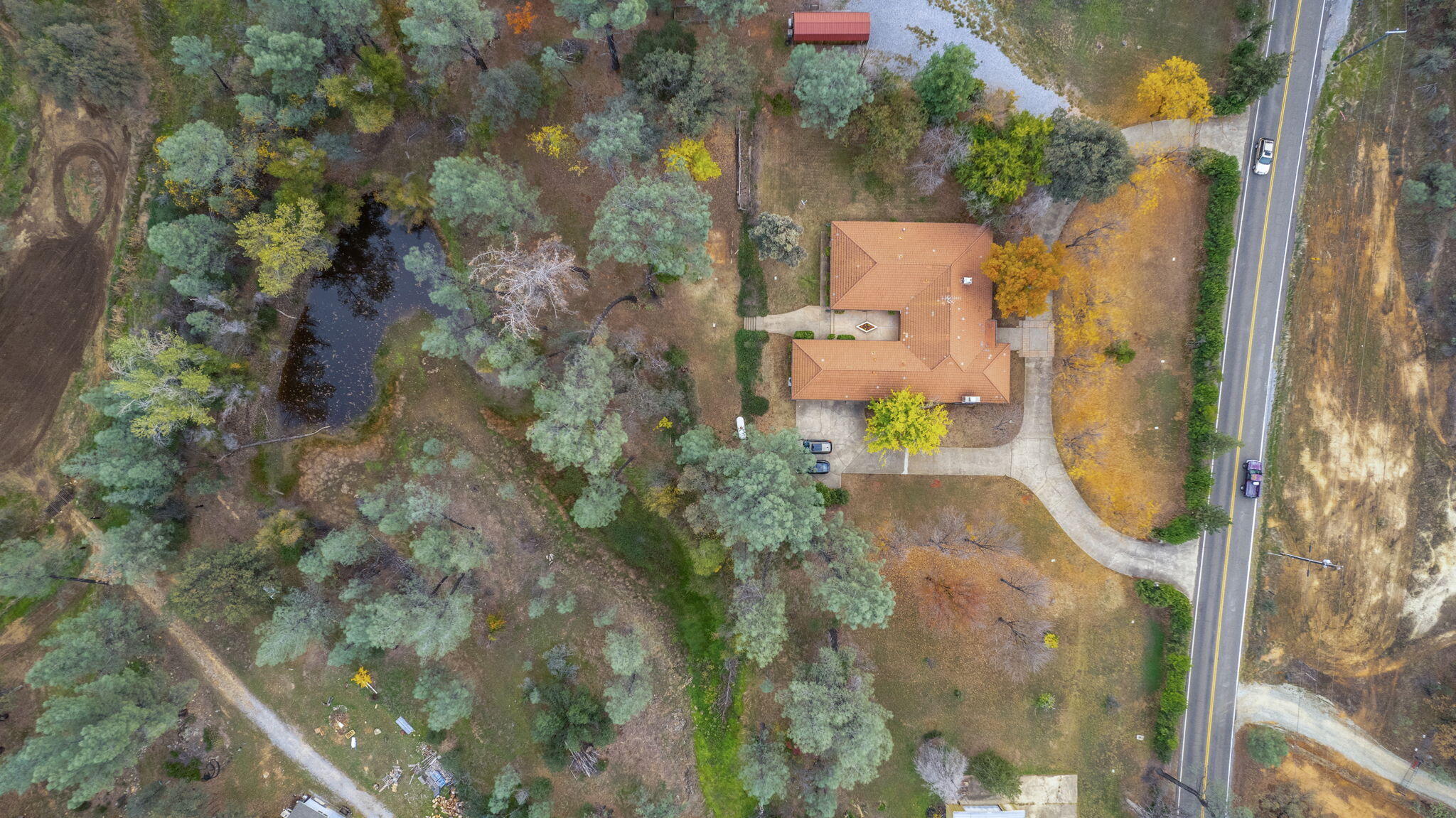 13144 Bear Mountain Road Redding, CA 96003 - Photo 67 of 69 an aerial view of residential house with outdoor space