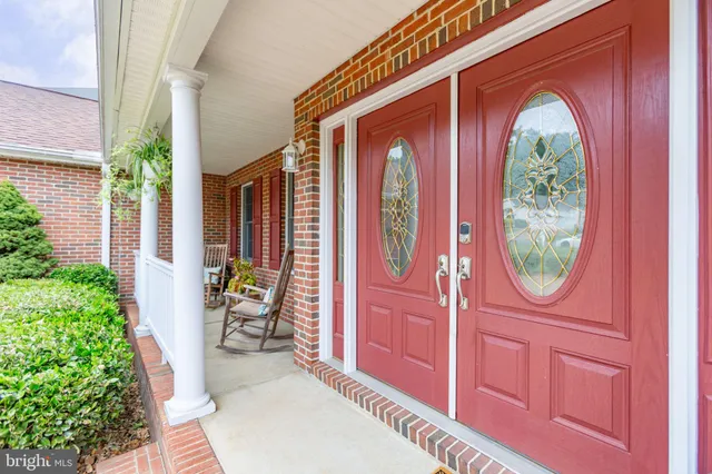 a kitchen with cabinets a sink and appliances