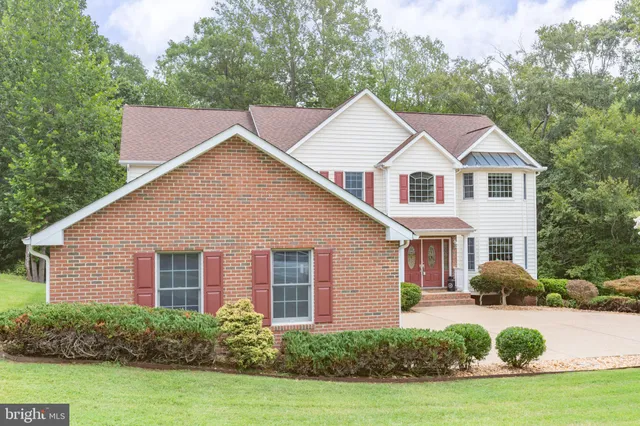 a kitchen with sink a stove and refrigerator