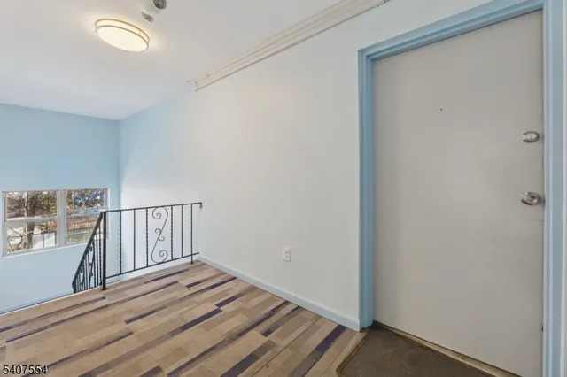 a view of livingroom with wooden floor