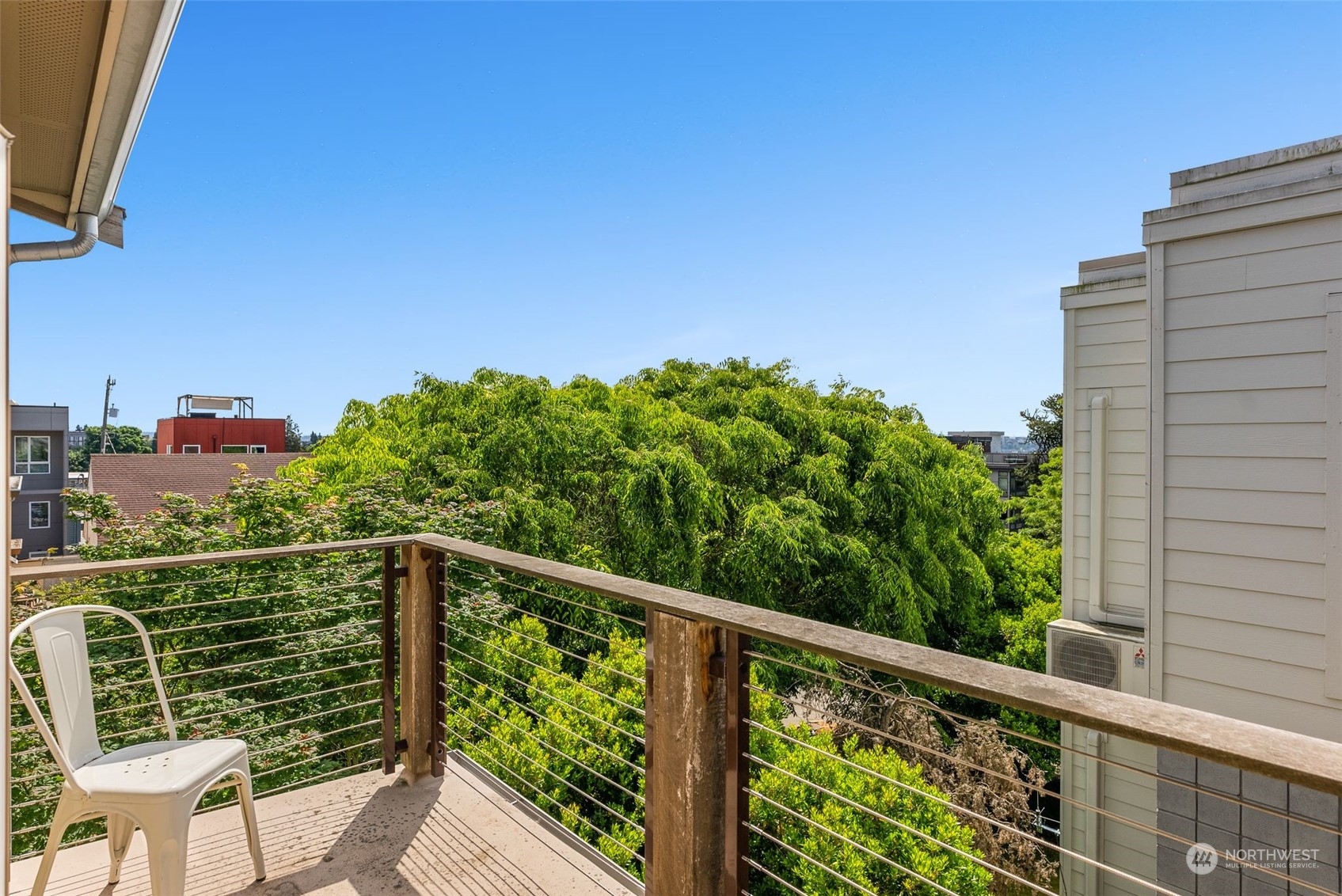 723 North 42nd Street Seattle, WA 98103 - Photo 24 of 27 a view of a balcony with chairs