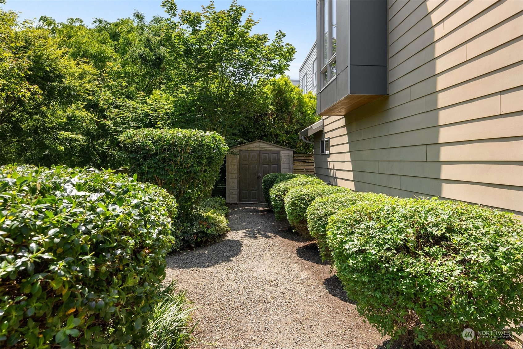 723 North 42nd Street Seattle, WA 98103 - Photo 25 of 27 a view of a backyard with plants