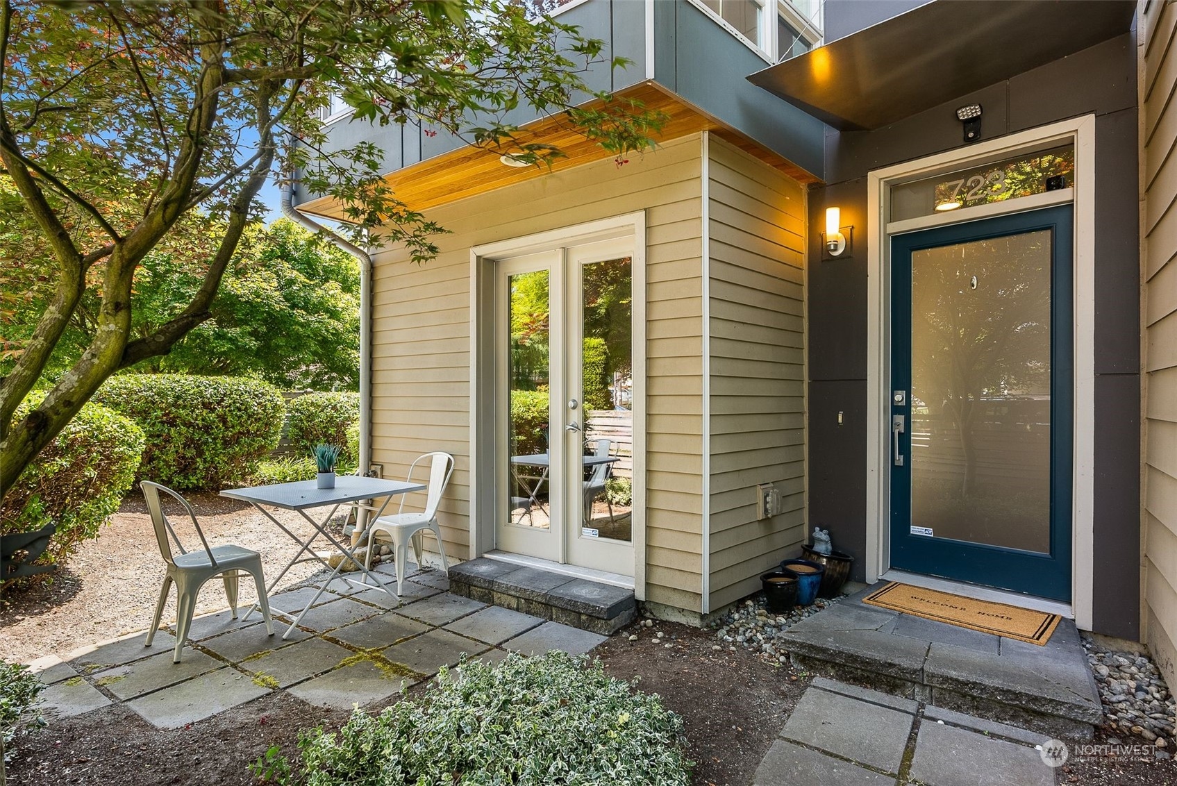 723 North 42nd Street Seattle, WA 98103 - Photo 4 of 27 a view of an house with backyard and sitting area