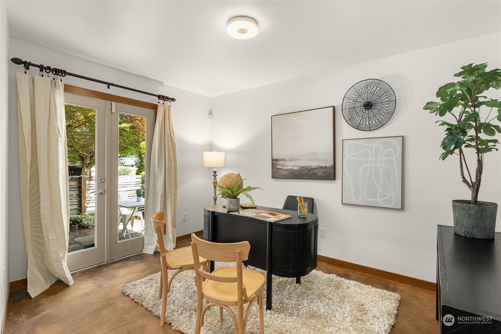 723 North 42nd Street Seattle, WA 98103 - Photo 5 of 27 a dining room with furniture and window